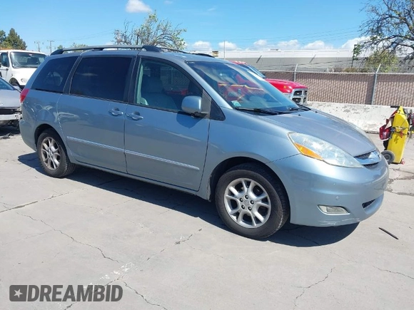 2006 Toyota Sienna XLE with VIN 5TDZA22CX6S555163, listed as a IAAI auction lot 41936624 with 230,825 mi miles. Bid and sale history available at carsss.com. Image 1.