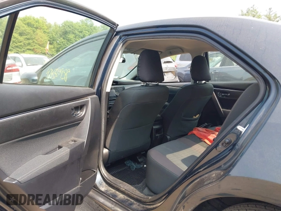 2018 Toyota Corolla L with VIN 2T1BURHE1JC052651, listed as a IAAI auction lot 42430958 with 104,664 mi miles and . Bid and sale history available at DreamBid. Image 8.