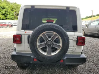 2020 Jeep Wrangler Unlimited Sahara with VIN 1C4HJXEG4LW272051, listed as a Copart auction lot 61090665 with 100,148 mi miles and Clean title. Bid and sale history available at DreamBid. Image 6.