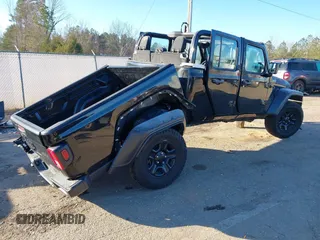 2021 Jeep Gladiator Sport S z VIN 1C6JJTAG4ML599463, wystawiony jako IAAI lot #41312938 z przebiegiem 169 189 mil mil oraz . Historia ofert i sprzedaży dostępna na DreamBid. Obrazek 4.