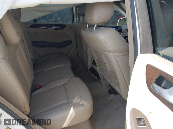 2014 Mercedes-Benz M 350 with VIN 4JGDA5HB9EA424811, listed as a IAAI auction lot 42079690 with 127,914 mi miles and . Bid and sale history available at DreamBid. Image 8.