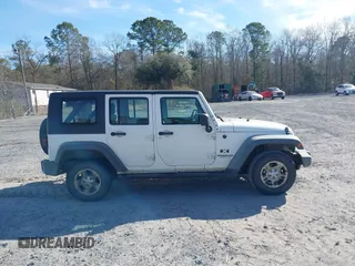 2009 Jeep Wrangler Unlimited X with VIN 1J4GZ39109L729171, listed as a IAAI auction lot 41715448 with 367,882 mi miles. Bid and sale history available at carsss.com. Image 13.
