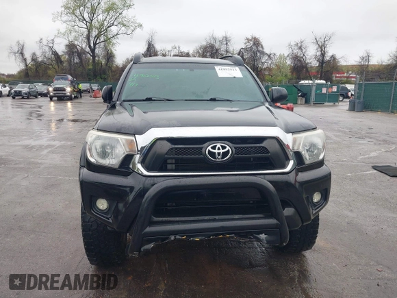 2015 Toyota Tacoma with VIN 3TMLU4ENXFM185371, listed as a IAAI auction lot 41952513 with 87,128 mi miles and . Bid and sale history available at DreamBid. Image 12.