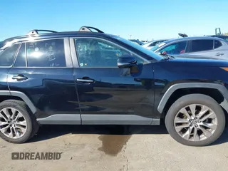 2019 Toyota RAV4 Limited with VIN JTMN1RFV5KD506624, listed as a IAAI auction lot 41657432 with 93,416 mi miles. Bid and sale history available at carsss.com. Image 14.