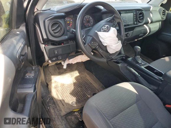 2021 Toyota Tacoma SR with VIN 3TYSX5EN1MT007634, listed as a Copart auction lot 81988814 with 104,002 mi miles and Salvage title. Bid and sale history available at DreamBid. Image 8.