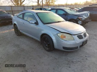 2007 Pontiac G5 with VIN 1G2AL15F777160719, listed as a IAAI auction lot 41769474 with 220,298 mi miles. Bid and sale history available at carsss.com. Image 1.