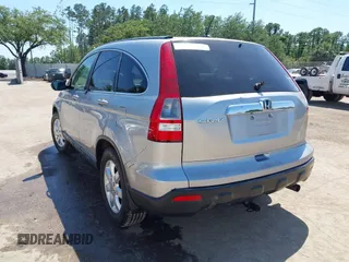 2007 Honda CR-V EX-L with VIN JHLRE38717C022984, listed as a IAAI auction lot 42028185 with 231,040 mi miles and . Bid and sale history available at carsss.com. Image 3.