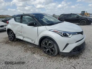 2019 Toyota C-HR XLE with VIN NMTKHMBX4KR100572, listed as a Copart auction lot 54371845 with 42,917 mi miles and Salvage Title. Bid and sale history available at DreamBid. Image 4.