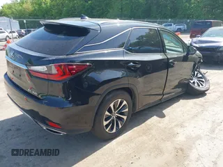 2021 Lexus RX 350 with VIN 2T2HZMDA1MC260014, listed as a IAAI auction lot 42158850 with 32,453 mi miles and . Bid and sale history available at DreamBid. Image 4.
