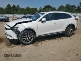 2018 Mazda CX-9 Grand Touring with VIN JM3TCBDY0J0208257, listed as a Copart auction lot 59792655 with 77,575 mi miles and Salvage title. Bid and sale history available at DreamBid. Image 1.