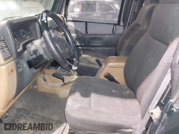1999 Jeep Wrangler SE with VIN 1J4FY29P4XP457291, listed as a IAAI auction lot 41549758 with 133,362 mi miles and . Bid and sale history available at DreamBid. Image 8.