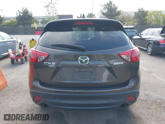 2016 Mazda CX-5 Grand Touring z VIN JM3KE4DY2G0684066, wystawiony jako IAAI lot #42078725 z przebiegiem 200 129 mil mil oraz . Historia ofert i sprzedaży dostępna na DreamBid. Obrazek 16.