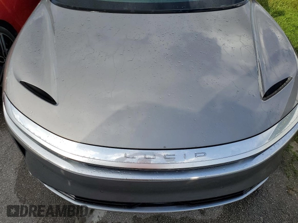 2024 Lucid Air Pure z VIN 50EA1PGA2RA005678, wystawiony jako Copart lot #73879864 z przebiegiem 1548 mil mil oraz Nie do naprawy. Historia ofert i sprzedaży dostępna na DreamBid. Obrazek 11.