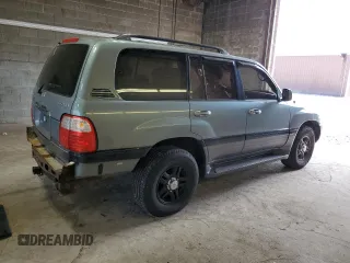 2001 Lexus LX 470 z VIN JTJHT00W113505721, wystawiony jako Copart lot #56463665 z przebiegiem 223 553 mil mil oraz Szkody całkowita. Historia ofert i sprzedaży dostępna na DreamBid. Obrazek 3.