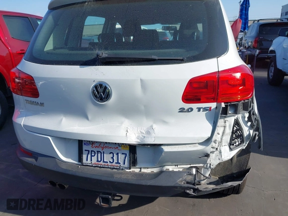 2015 Volkswagen Tiguan S z VIN WVGAV7AX7FW564563, wystawiony jako IAAI lot #42369715 z przebiegiem 27 976 mil mil oraz . Historia ofert i sprzedaży dostępna na DreamBid. Obrazek 6.