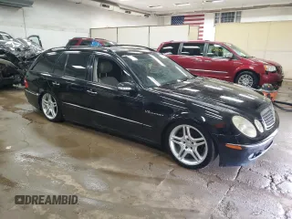2006 Mercedes-Benz E 500 with VIN WDBUH83J86X187774, listed as a Copart auction lot 71743564 with 202,865 mi miles and Clean Title. Bid and sale history available at carsss.com. Image 4.
