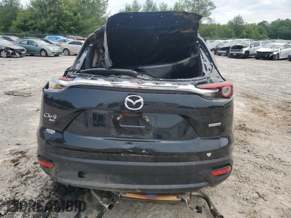 2023 Mazda CX-9 Touring z VIN JM3TCBCY5P0647237, wystawiony jako Copart lot #56338625 z przebiegiem Nie podano mil oraz Szkoda całkowita • Salvage title. Historia ofert i sprzedaży dostępna na DreamBid. Obrazek 6.