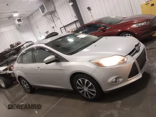 2012 Ford Focus SE with VIN 1FAHP3F24CL217049, listed as a IAAI auction lot 41825450 with 86,573 mi miles. Bid and sale history available at carsss.com. Image 14.