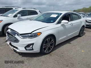 2019 Ford Fusion Titanium with VIN 3FA6P0D91KR140260, listed as a IAAI auction lot 41931629 with 95,207 mi miles. Bid and sale history available at carsss.com. Image 2.