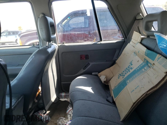 1997 Isuzu Rodeo z VIN 4S2CM58V0V4337626, wystawiony jako Copart lot #55491015 z przebiegiem 163 499 mil mil oraz Tytuł czysty. Historia ofert i sprzedaży dostępna na DreamBid. Obrazek 10.