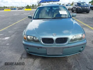 2005 BMW 3 Series 325i with VIN WBAEV33415KW16936, listed as a IAAI auction lot 41094134 with 208,794 mi miles. Bid and sale history available at carsss.com. Image 6.