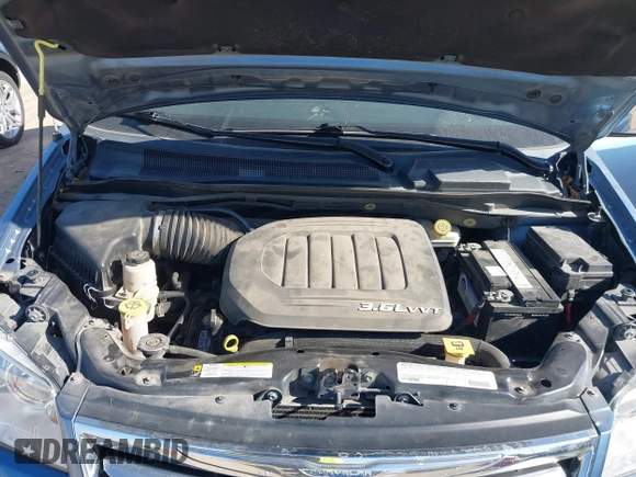 2012 Chrysler Town & Country Touring L with VIN 2C4RC1CG9CR163477, listed as a IAAI auction lot 41214896 with 112,763 mi miles and . Bid and sale history available at DreamBid. Image 10.