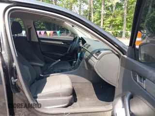 2014 Volkswagen Passat Wolfsburg Edition with VIN 1VWAT7A35EC056127, listed as a IAAI auction lot 42497467 with 111,443 mi miles and . Bid and sale history available at DreamBid. Image 5.