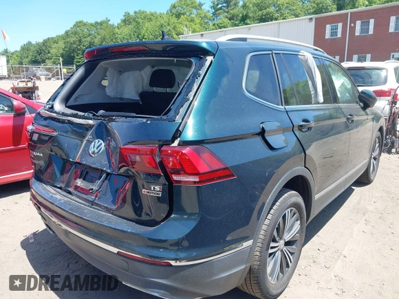 2018 Volkswagen Tiguan SEL with VIN 3VV2B7AX9JM058518, listed as a IAAI auction lot 42558129 with 82,807 mi miles and . Bid and sale history available at DreamBid. Image 4.