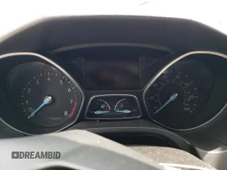 2015 Ford Focus Titanium z VIN 1FADP3N24FL262321, wystawiony jako Copart lot #59635525 z przebiegiem Nie podano mil oraz Szkoda całkowita • Salvage title. Historia ofert i sprzedaży dostępna na DreamBid. Obrazek 9.
