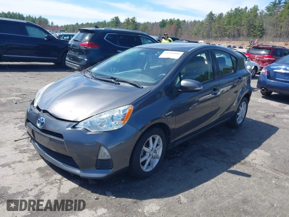 2014 Toyota Prius One z VIN JTDKDTB32E1070932, wystawiony jako IAAI lot #41950966 z przebiegiem 93 952 mil mil oraz . Historia ofert i sprzedaży dostępna na DreamBid. Obrazek 2.