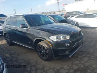 2014 BMW X5 sDrive35i with VIN 5UXKR2C50E0H31926, listed as a IAAI auction lot 41838021 with 125,813 mi miles. Bid and sale history available at carsss.com. Image 1.