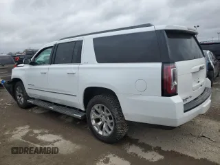 2017 GMC Yukon XL SLE with VIN 1GKS2FKC2HR215016, listed as a Copart auction lot 49651765 with 144,603 mi miles and Salvage Title. Bid and sale history available at carsss.com. Image 2.