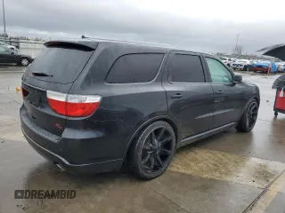 2013 Dodge Durango R/T with VIN 1C4SDHCTXDC520650, listed as a Copart auction lot 49253535 with 146,201 mi miles and Clean title. Bid and sale history available at DreamBid. Image 3.