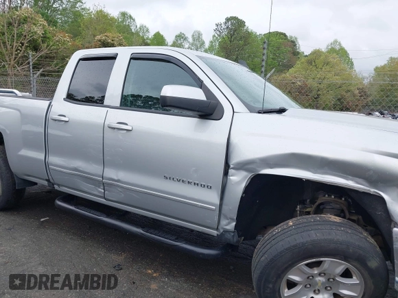2018 Chevrolet Silverado 1500 LT with VIN 1GCVKREC7JZ151678, listed as a IAAI auction lot 41972011 with 106,892 mi miles and . Bid and sale history available at DreamBid. Image 13.