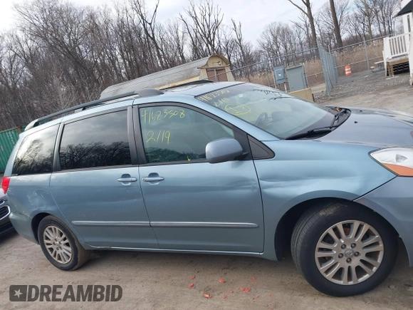 2008 Toyota Sienna XLE with VIN 5TDZK22C18S102498, listed as a IAAI auction lot 41623508 with 214,485 mi miles. Bid and sale history available at carsss.com. Image 13.