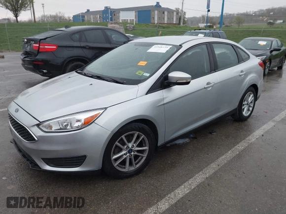 2017 Ford Focus SE with VIN 1FADP3F24HL303600, listed as a IAAI auction lot 41948159 with 95,212 mi miles and . Bid and sale history available at DreamBid. Image 2.