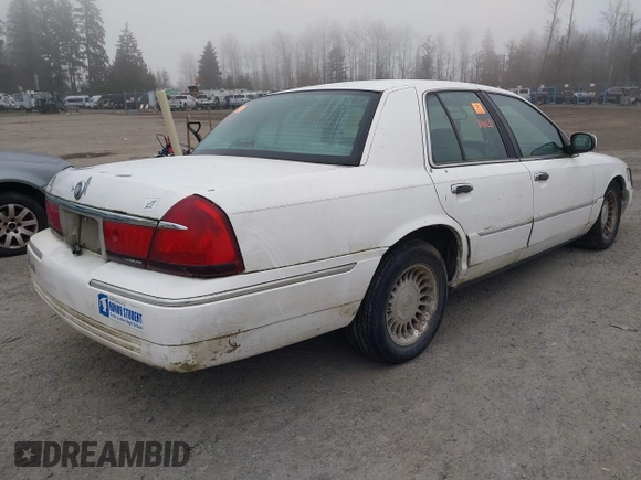 2001 Mercury Grand Marquis LS with VIN 2MEFM75W81X678887, listed as a IAAI auction lot 41254252 with 113,742 mi miles and . Bid and sale history available at DreamBid. Image 4.