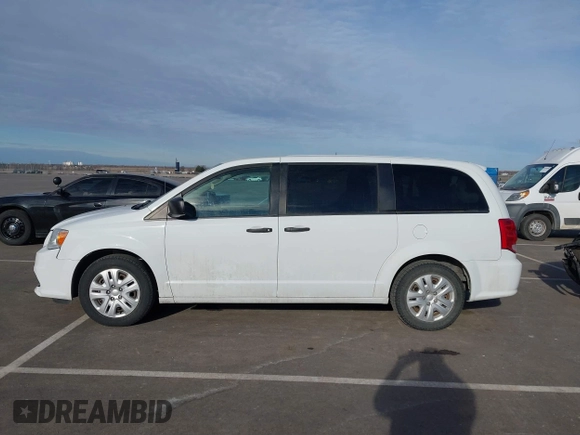 2019 Dodge Grand Caravan SE with VIN 2C4RDGBGXKR682747, listed as a IAAI auction lot 41840067 with 176,446 mi miles and . Bid and sale history available at DreamBid. Image 14.