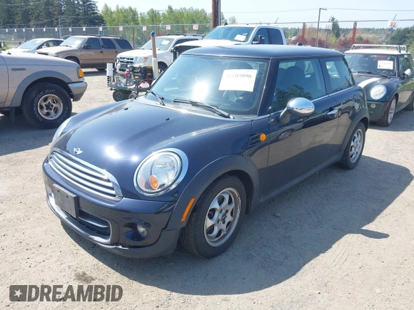 2013 MINI Cooper Hardtop with VIN WMWSU3C56DT679117, listed as a IAAI auction lot 42105896 with 75,523 mi miles. Bid and sale history available at carsss.com. Image 2.