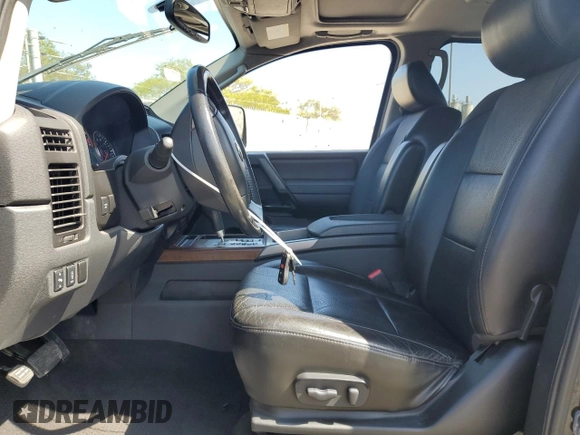2011 Nissan Titan SL with VIN 1N6BA0EC4BN319994, listed as a Copart auction lot 55088175 with 103,008 mi miles and Salvage title. Bid and sale history available at DreamBid. Image 7.