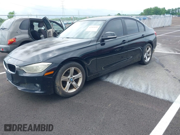 2015 BMW 3 Series 320i with VIN WBA3B1G57FNT05826, listed as a IAAI auction lot 42103193 with 128,800 mi miles. Bid and sale history available at carsss.com. Image 16.