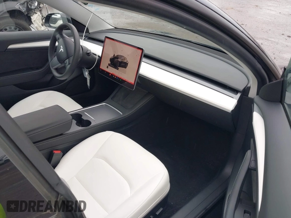 2023 Tesla Model 3 with VIN 5YJ3E1EA0PF587656, listed as a IAAI auction lot 41489586 with 12,844 mi miles and . Bid and sale history available at DreamBid. Image 5.
