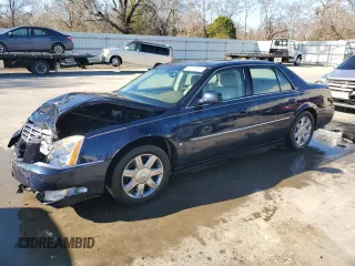 2006 Cadillac DTS 1SB z VIN 1G6KD57Y56U220535, wystawiony jako Copart lot #89196185 z przebiegiem 94 312 mil mil oraz Szkody całkowita. Historia ofert i sprzedaży dostępna na DreamBid. Obrazek 1.