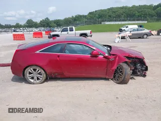 2014 Cadillac CTS Performance z VIN 1G6DG1E33E0135490, wystawiony jako IAAI lot #42274193 z przebiegiem 83 556 mil mil oraz . Historia ofert i sprzedaży dostępna na DreamBid. Obrazek 13.