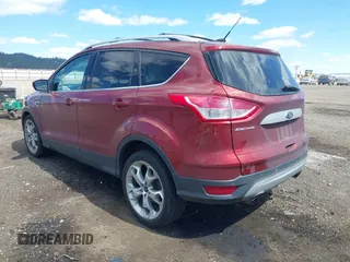 2014 Ford Escape Titanium with VIN 1FMCU9J91EUB53601, listed as a IAAI auction lot 42066465 with 105,933 mi miles and . Bid and sale history available at DreamBid. Image 3.