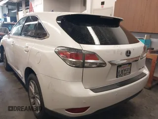 2015 Lexus RX 450h with VIN 2T2ZB1BA0FC003410, listed as a IAAI auction lot 41548839 with 89,742 mi miles and . Bid and sale history available at DreamBid. Image 3.