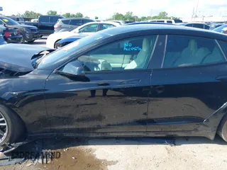 2022 Tesla Model S Plaid with VIN 5YJSA1E63NF478351, listed as a IAAI auction lot 42056199 with Not provided miles and . Bid and sale history available at DreamBid. Image 13.