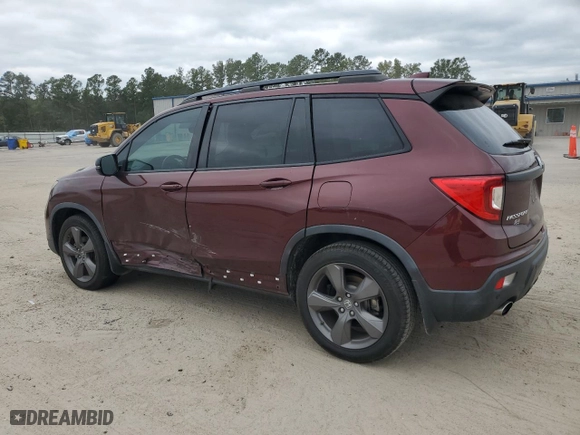 2020 Honda Passport Touring with VIN 5FNYF7H94LB001817, listed as a Copart auction lot 69430964 with 63,147 mi miles and Salvage Title. Bid and sale history available at carsss.com. Image 2.