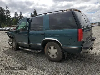 1998 Chevrolet Tahoe z VIN 1GNEK13R2WJ304666, wystawiony jako Copart lot #57833815 z przebiegiem 199 103 mil mil oraz Szkoda całkowita • Salvage title. Historia ofert i sprzedaży dostępna na DreamBid. Obrazek 2.