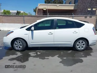 2009 Toyota Prius with VIN JTDKB20U397855359, listed as a IAAI auction lot 42223095 with 263,129 mi miles and . Bid and sale history available at DreamBid. Image 14.